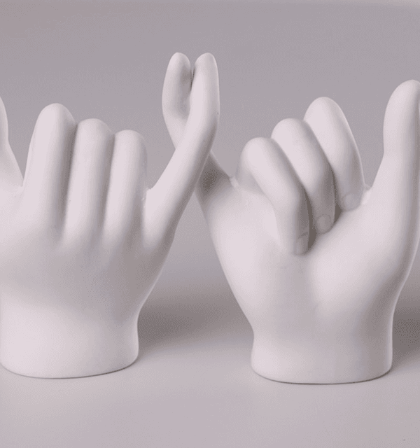 Two hands forming a promise gesture